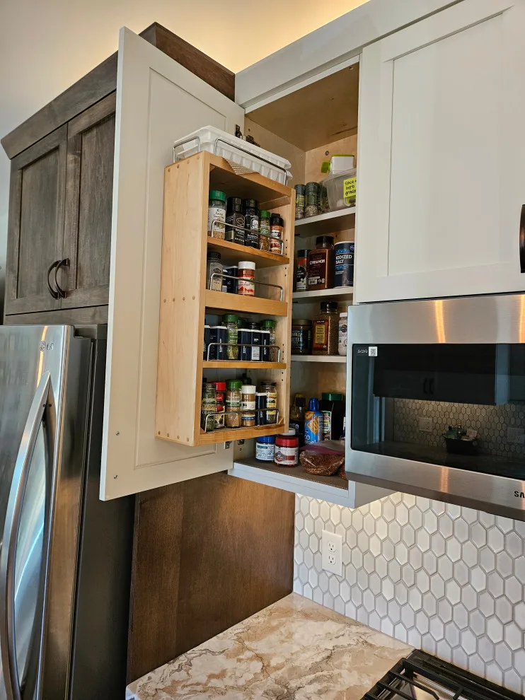 Modern Kitchen Renovation Featuring Various Storage Solutions by Kitchen Solvers Of Spring Hill - Photo 24