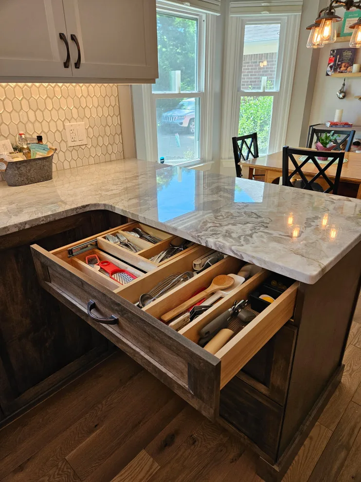Modern Kitchen Renovation Featuring Various Storage Solutions by Kitchen Solvers Of Spring Hill - Photo 26