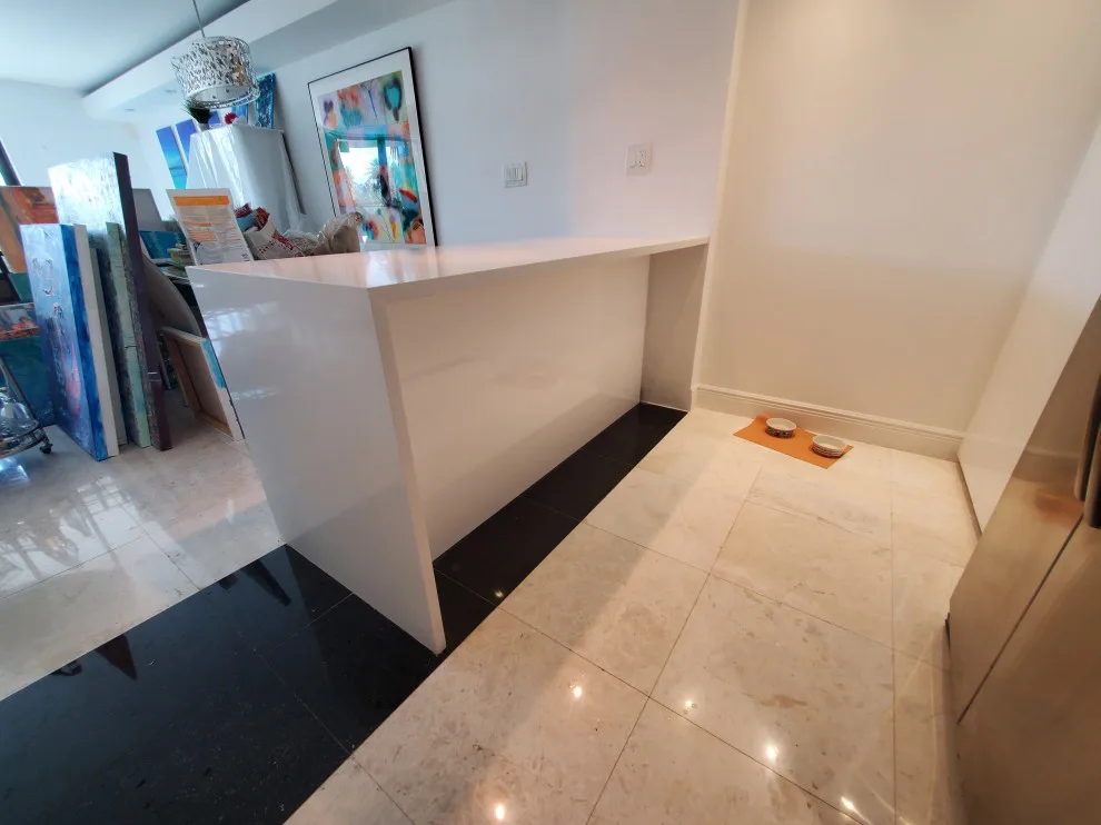Contemporary Kitchen Renovation Featuring a Glossy White Finish by Kitchen Solvers Of Fort Lauderdale - Photo 5