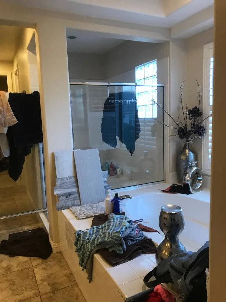 Grey and White Bathroom Renovation by Amos Tile LV - Photo 4