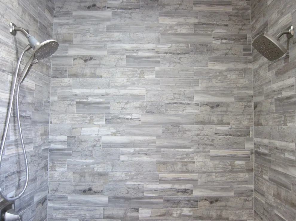 Grey and White Bathroom Renovation by Amos Tile LV - Photo 7