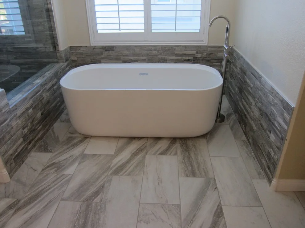 Grey and White Bathroom Renovation by Amos Tile LV - Photo 6