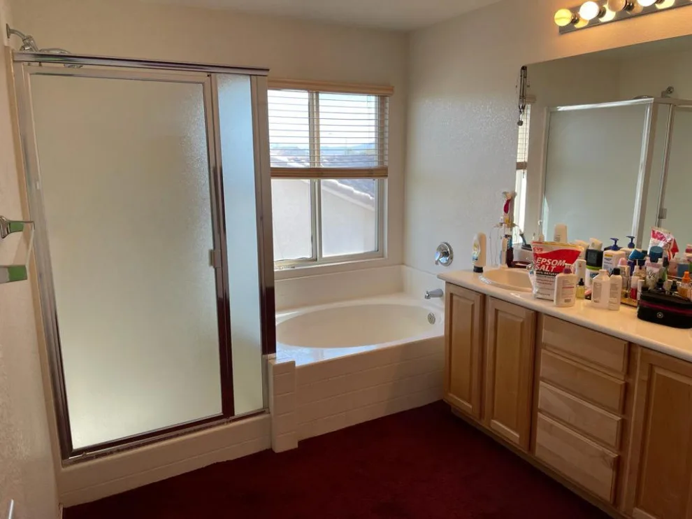 Silver and white marble bathroom renovation by Amos Tile LV - Photo 7