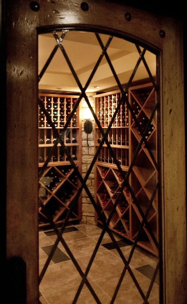 Wine Vault with Slate, Mahogany, and Stone Features by Lorrien Homes & Remodeling - Photo 5