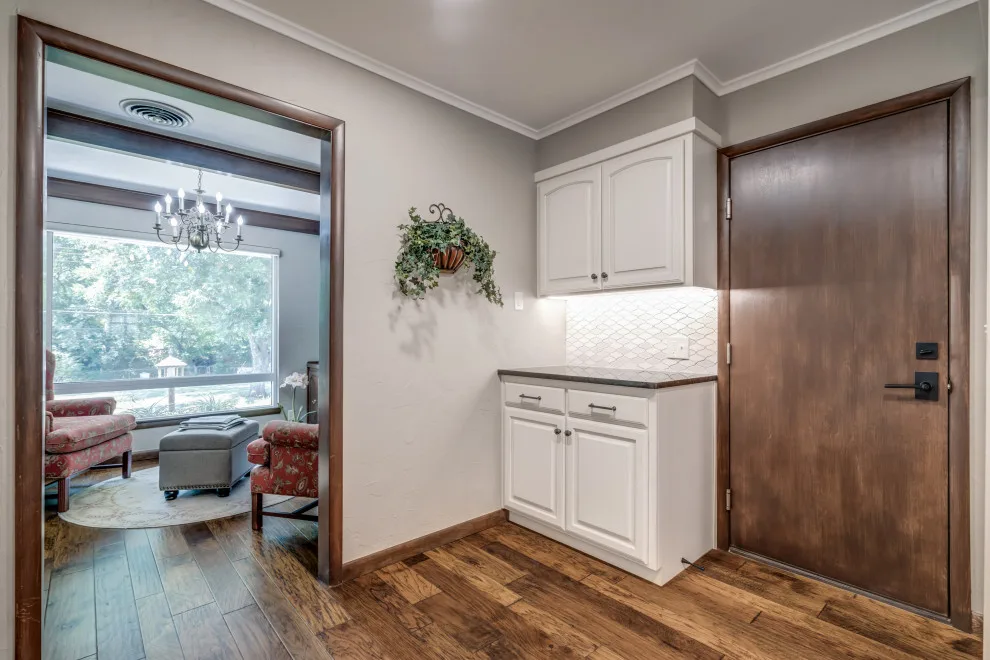 Transitional Monochrome Kitchen by Heritage Renovations - Photo 14