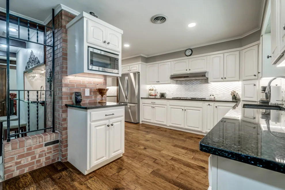 Transitional Monochrome Kitchen by Heritage Renovations - Photo 12