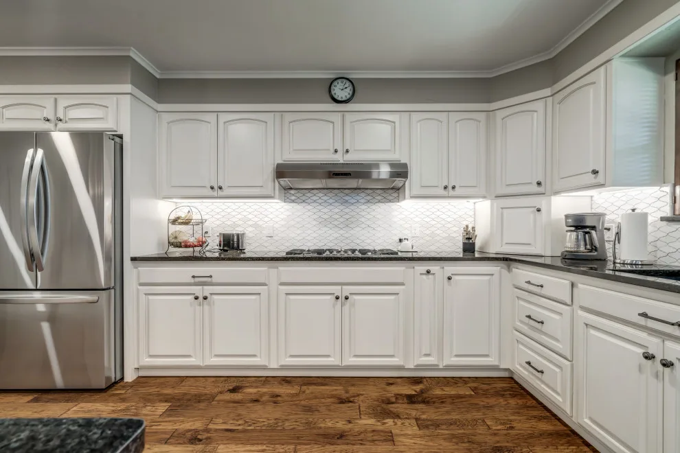 Transitional Monochrome Kitchen by Heritage Renovations - Photo 13