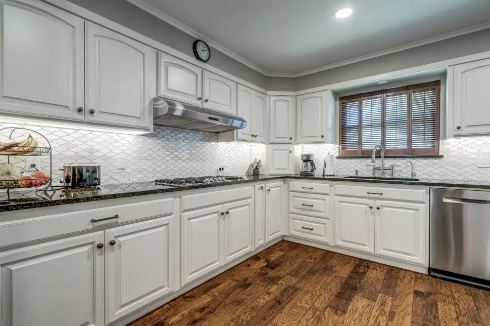 Transitional Monochrome Kitchen by Heritage Renovations - Photo 15