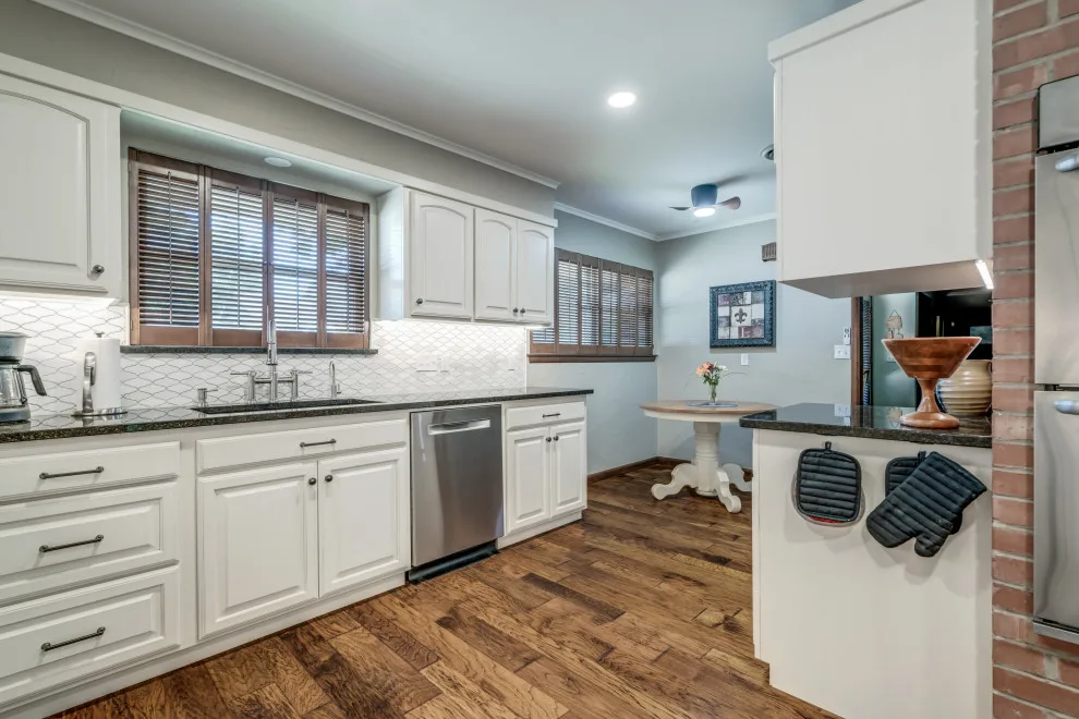 Transitional Monochrome Kitchen by Heritage Renovations - Photo 18