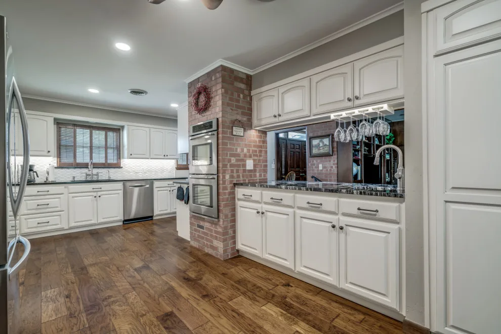 Transitional Monochrome Kitchen by Heritage Renovations - Photo 27