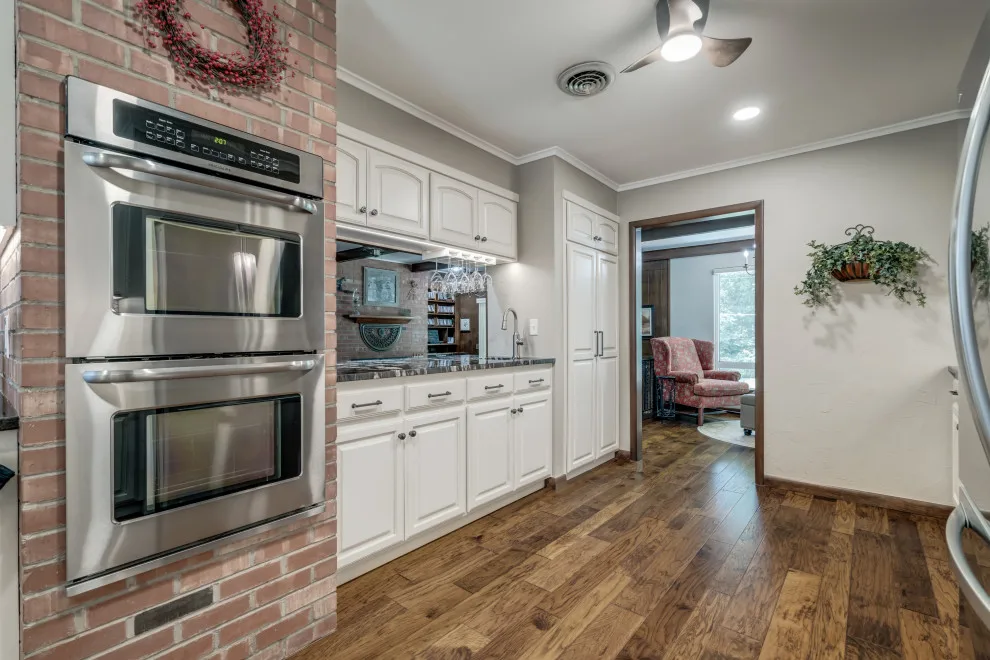 Transitional Monochrome Kitchen by Heritage Renovations - Photo 20