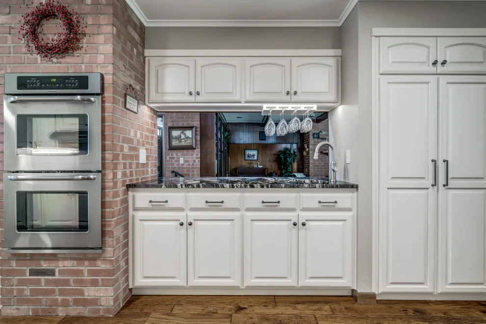 Transitional Monochrome Kitchen by Heritage Renovations - Photo 2