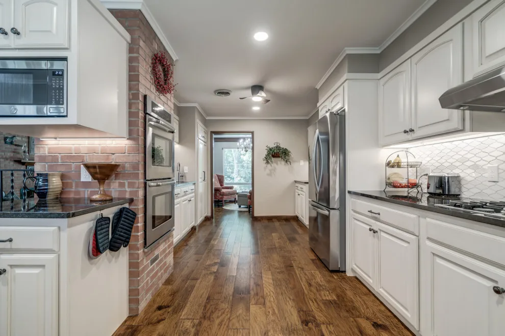 Transitional Monochrome Kitchen by Heritage Renovations - Photo 9