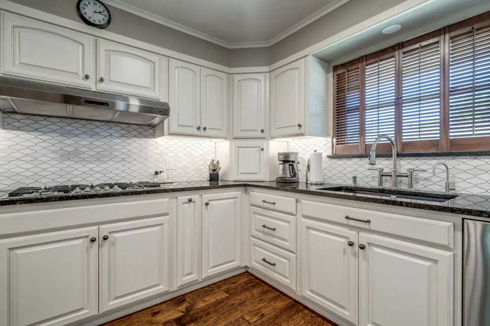 Transitional Monochrome Kitchen by Heritage Renovations - Photo 6