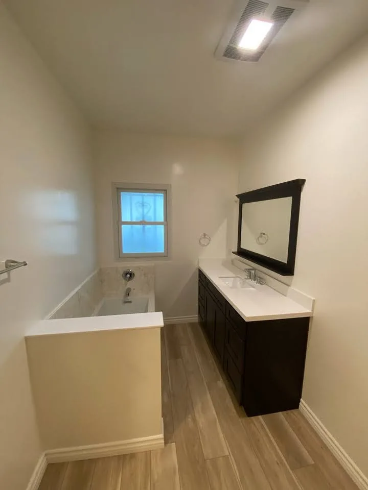 Century-Old Bathroom Renovation by American Home Remodeling - Photo 12