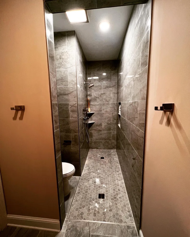Personalized shower and toilet combination by Homanvestments LLC & Extreme Custom Construction - Photo 8