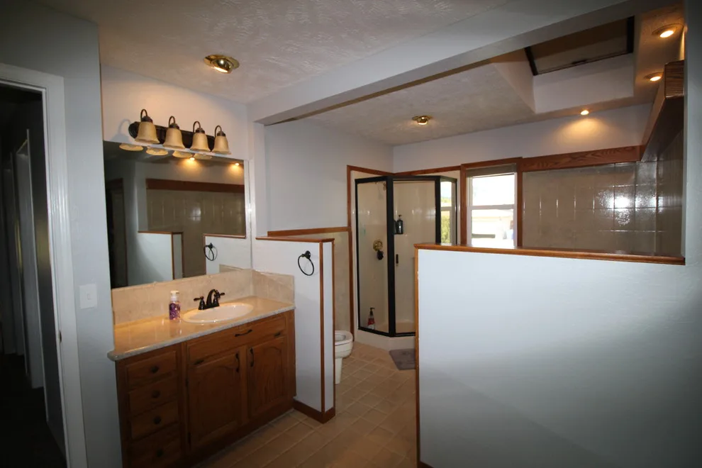 Monochrome Master Bathroom by Renewed Dwellings - Photo 4