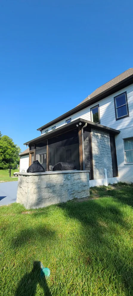 Bespoke fireplace, masonry, and screened porch by Stratton Exteriors - Photo 23
