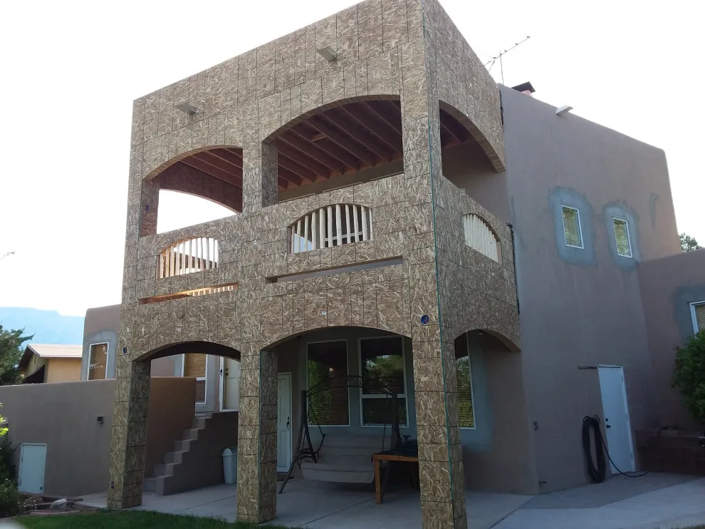 two-level porch by P.O.W.E.R. Construction - Photo 2