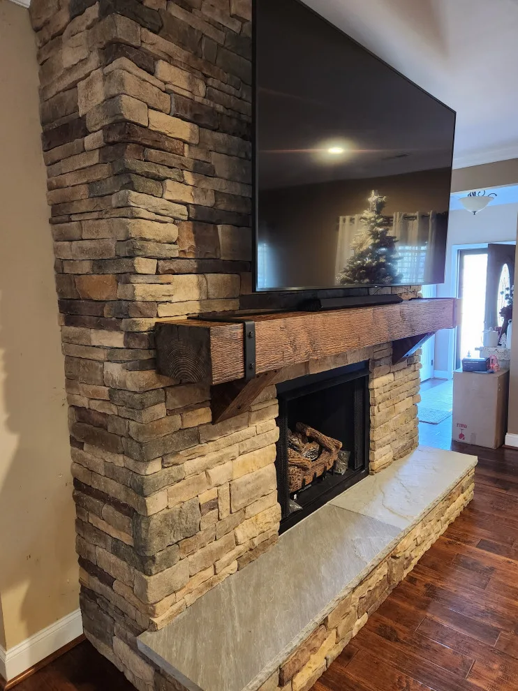 Fireplace enhancements by RTR Homes - Photo 3