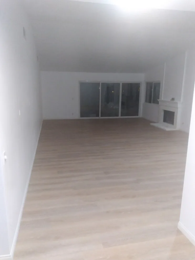 Flooring, popcorn ceiling removal, and interior painting by Rigos Painting Services - Photo 6