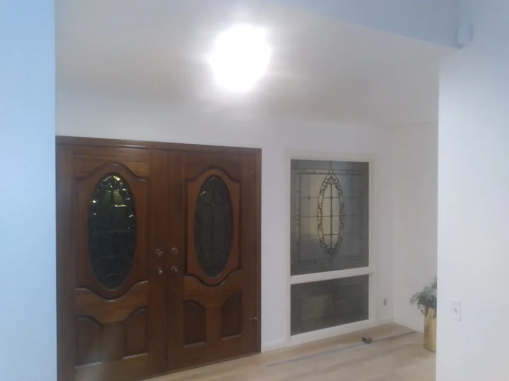 Flooring, popcorn ceiling removal, and interior painting by Rigos Painting Services - Photo 3