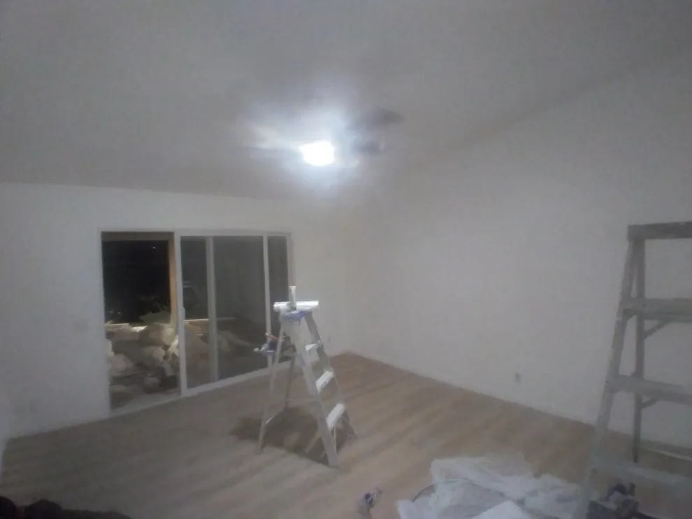 Flooring, popcorn ceiling removal, and interior painting by Rigos Painting Services - Photo 8