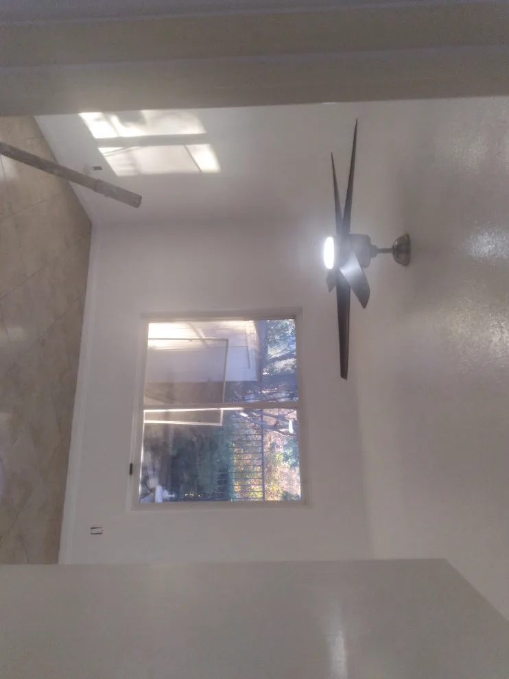 Flooring, popcorn ceiling removal, and interior painting by Rigos Painting Services - Photo 4