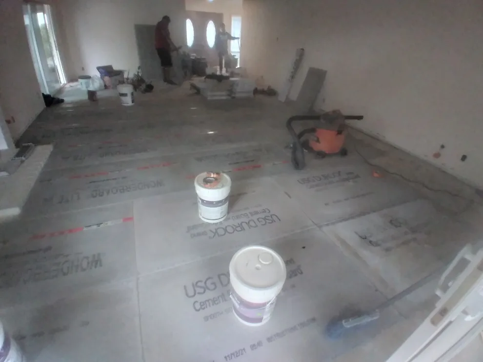 Flooring, popcorn ceiling removal, and interior painting by Rigos Painting Services - Photo 7