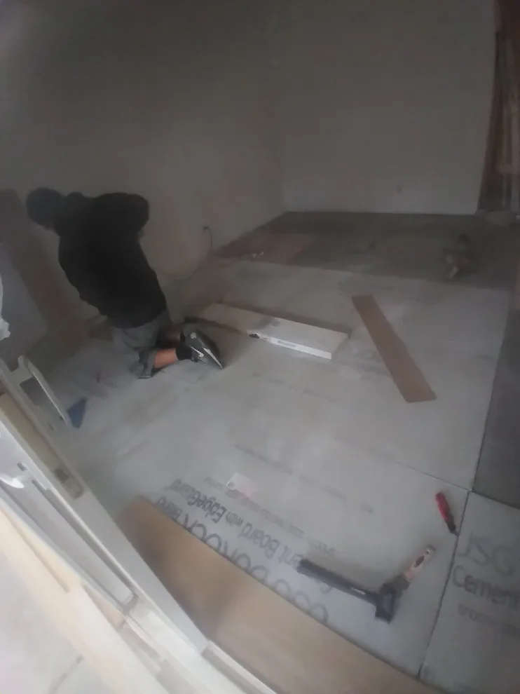 Flooring, popcorn ceiling removal, and interior painting by Rigos Painting Services - Photo 9