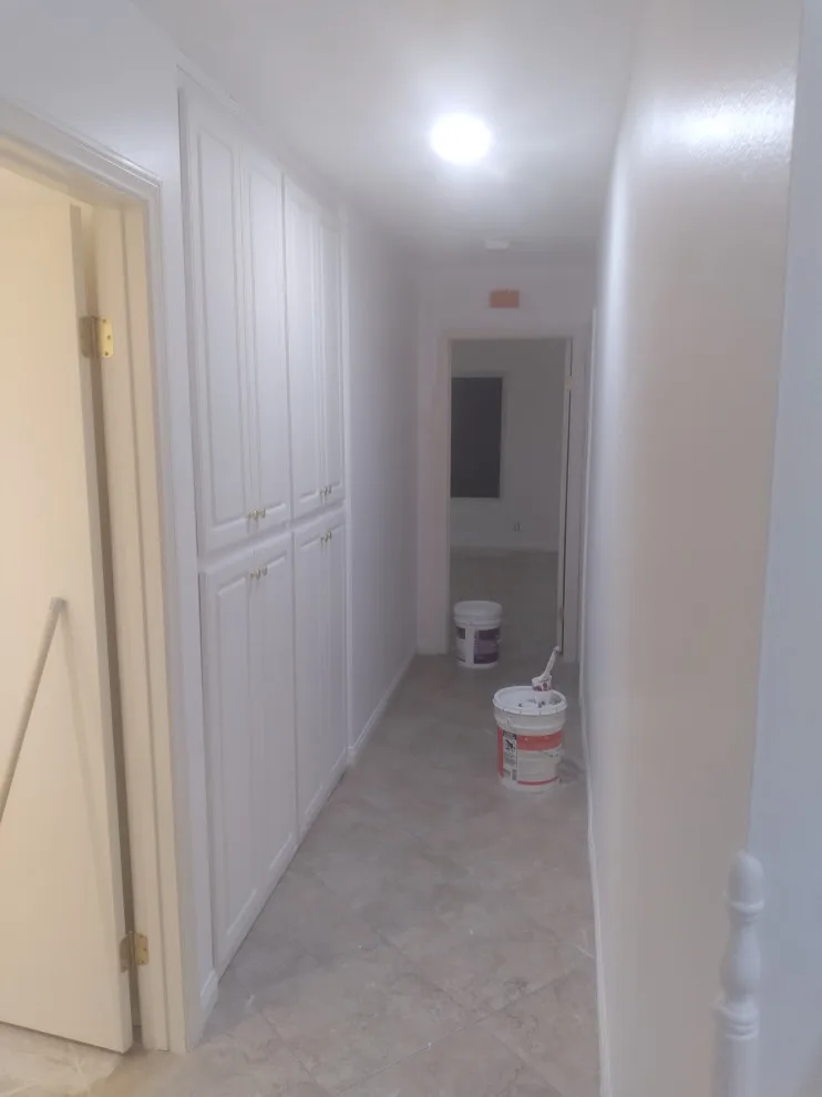 Flooring, popcorn ceiling removal, and interior painting by Rigos Painting Services - Photo 2