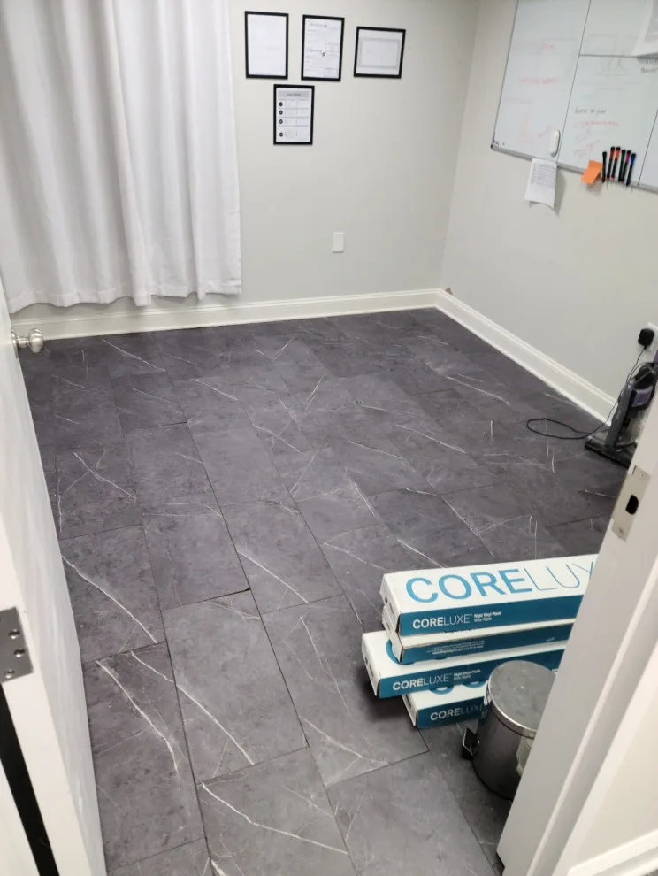 Premium Vinyl Flooring Installation by Butler Building & Restoration LLC - Photo 5
