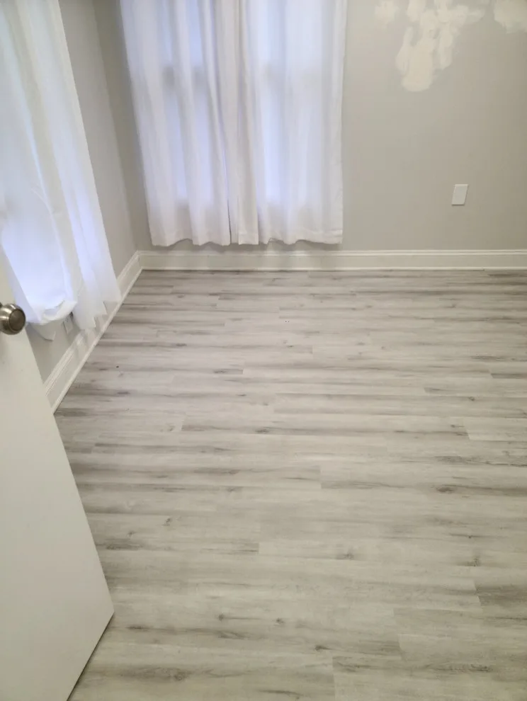 Premium Vinyl Flooring Installation by Butler Building & Restoration LLC - Photo 4