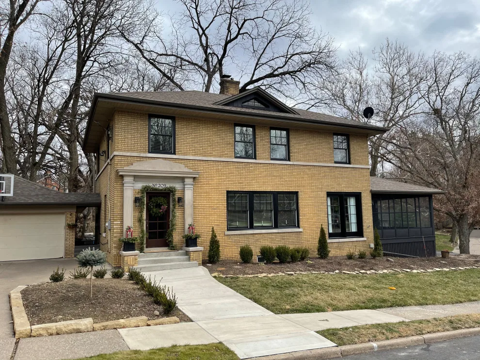 Updated black-framed Pella windows by Lank Construction - Photo 3