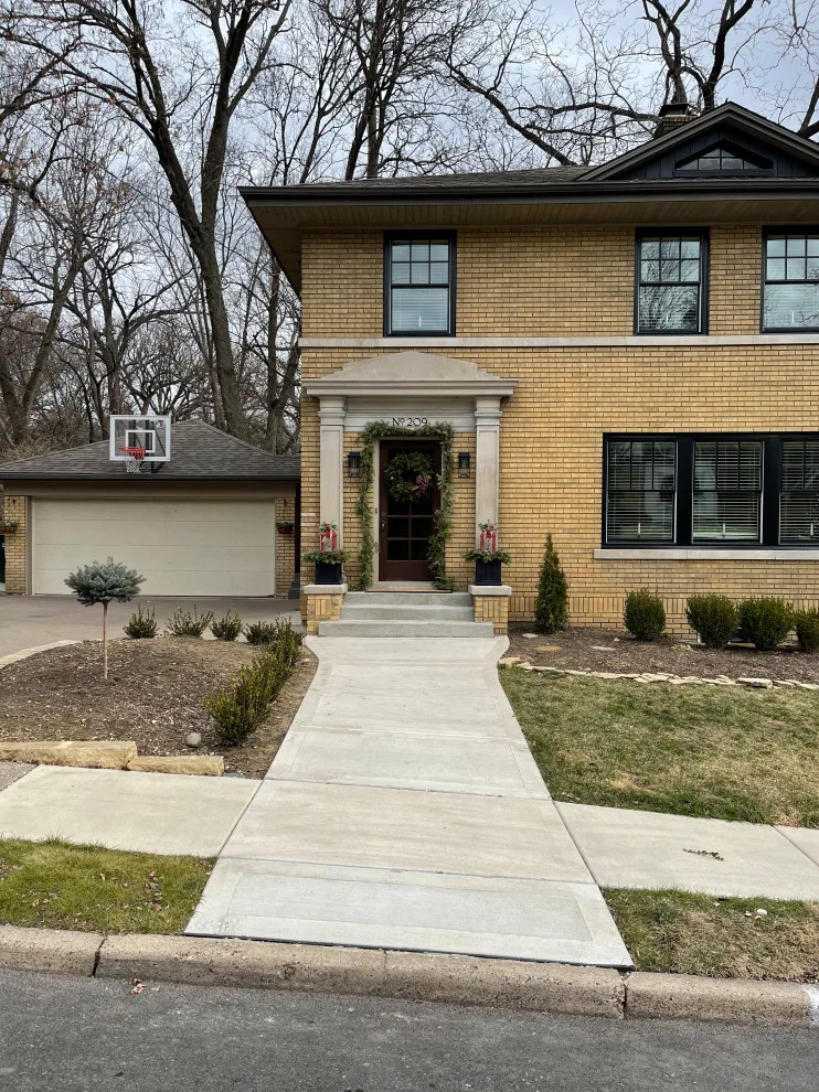 Updated black-framed Pella windows by Lank Construction - Photo 2
