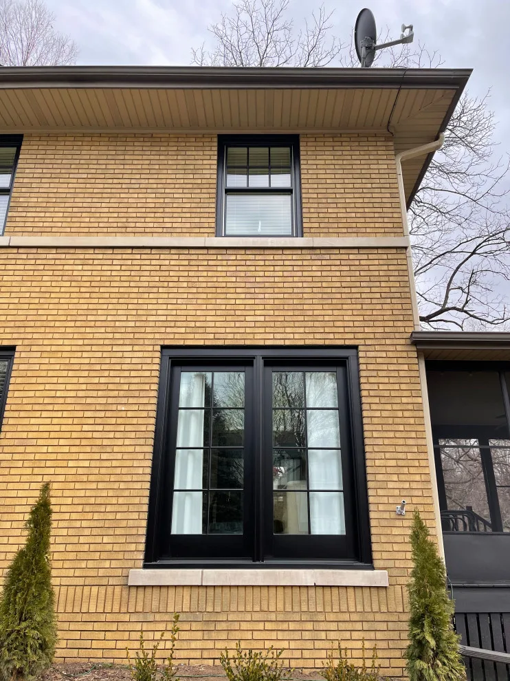 Updated black-framed Pella windows by Lank Construction - Photo 4