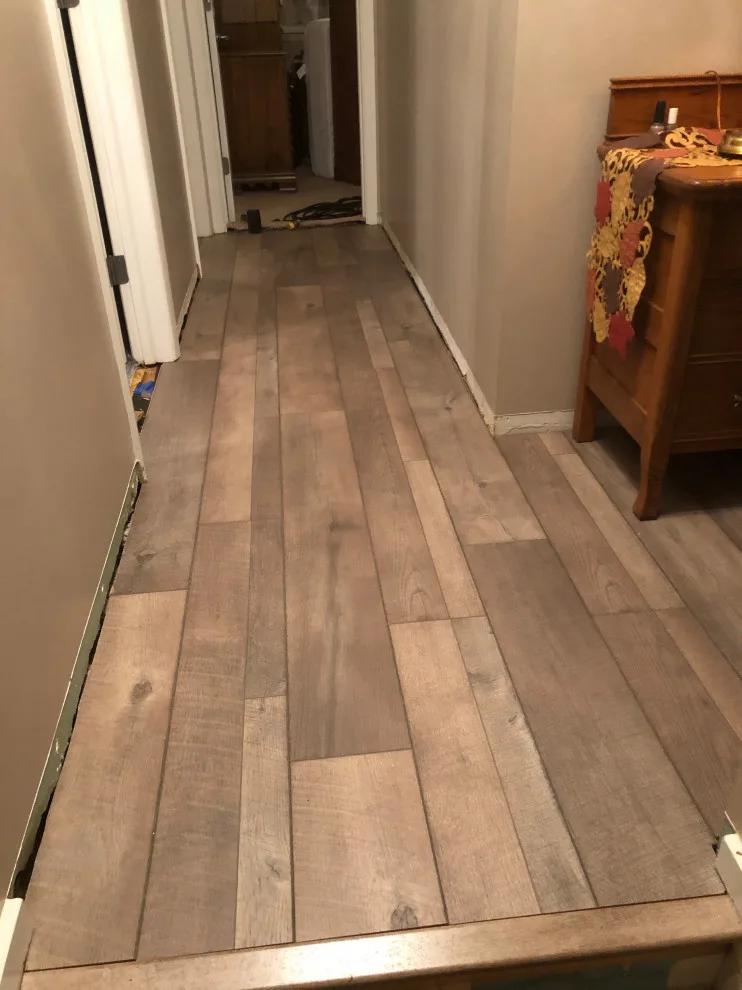 Installation of New Flooring by Fin's Home Care - Photo 4
