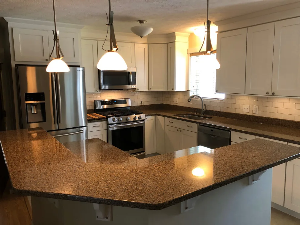 Quartz-topped white shaker kitchen by WNC Real Estate Services, LLC - Photo 2