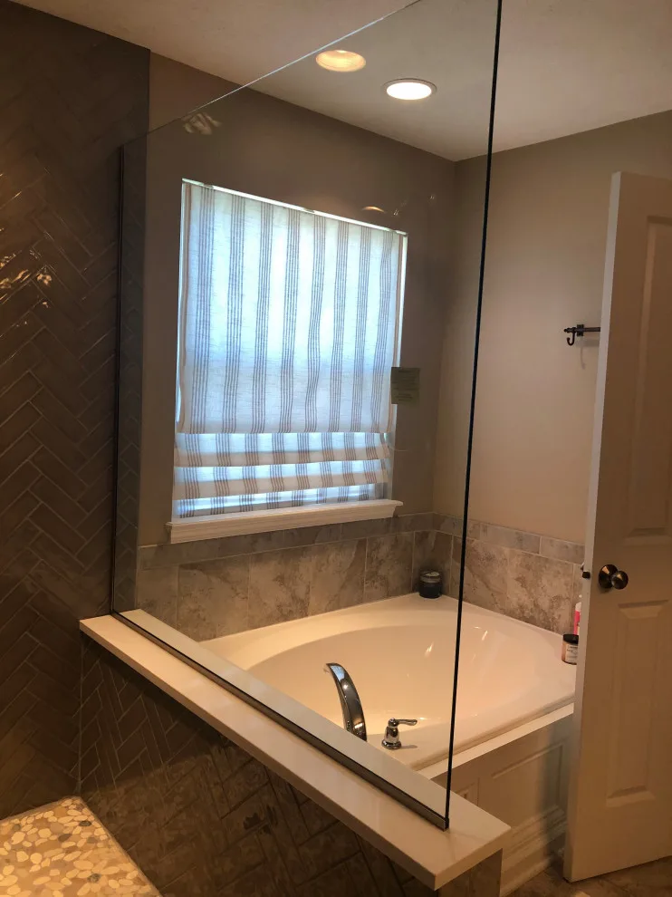 Gray Restroom by Homanvestments LLC & Extreme Custom Construction - Photo 5