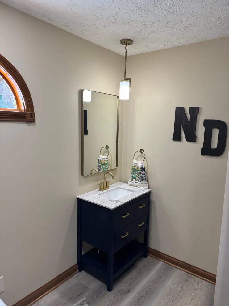 Notre Dame Restroom and Laundry Renovation by Homanvestments LLC & Extreme Custom Construction - Photo 4