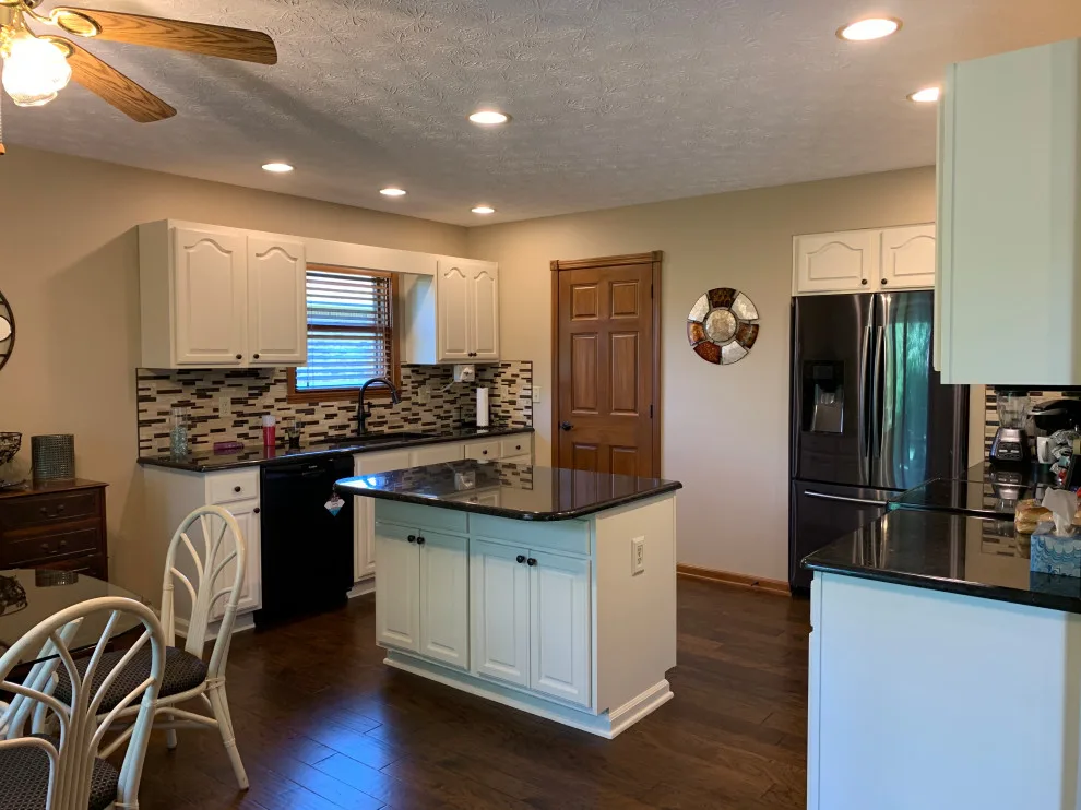 Cabinet painting and kitchen makeover by Homanvestments LLC & Extreme Custom Construction - Photo 2