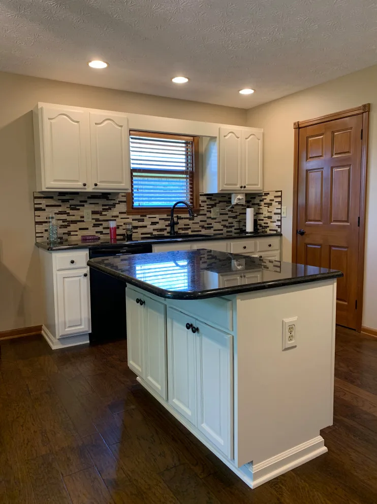 Cabinet painting and kitchen makeover by Homanvestments LLC & Extreme Custom Construction - Photo 5