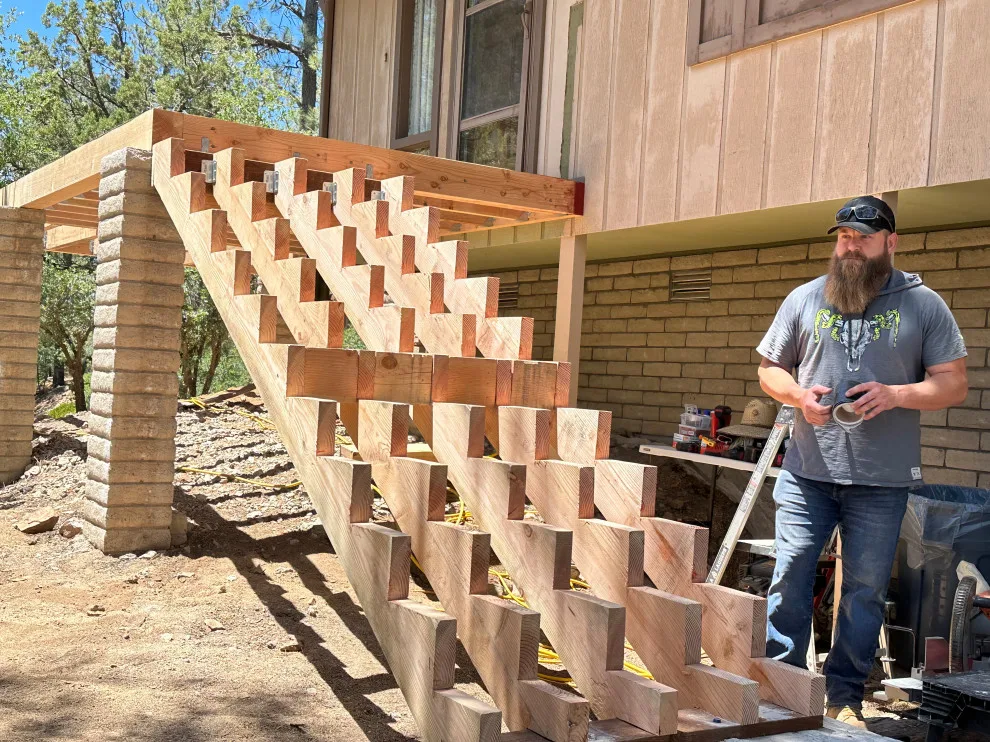 Deck demolition and reconstruction using Timber Tech/Azek decking and Fortress railing by RyMar Builders - Photo 5