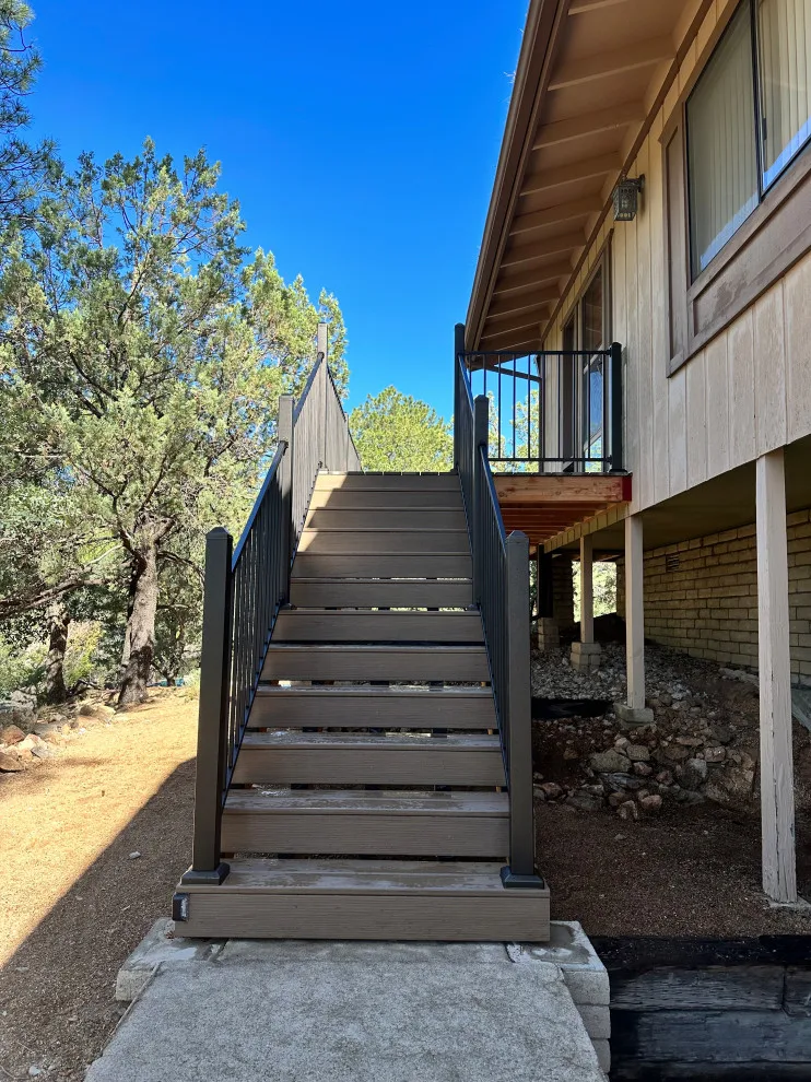 Deck demolition and reconstruction using Timber Tech/Azek decking and Fortress railing by RyMar Builders - Photo 8