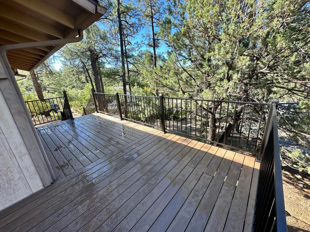 Deck demolition and reconstruction using Timber Tech/Azek decking and Fortress railing by RyMar Builders - Photo 7