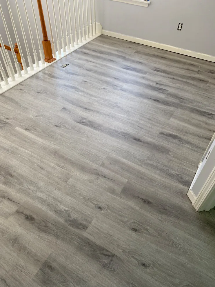 Stairs with vinyl plank and carpet by JCB Interiors LLC - Photo 6