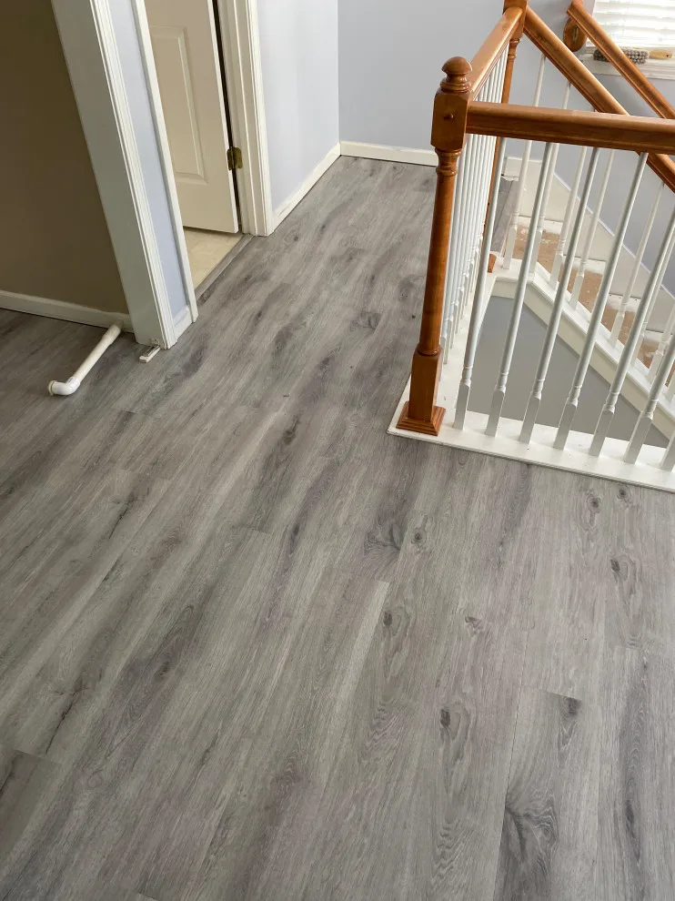 Stairs with vinyl plank and carpet by JCB Interiors LLC - Photo 4
