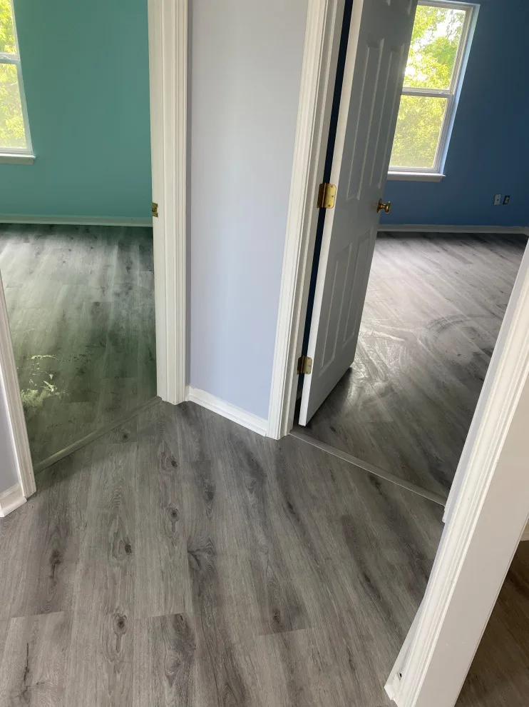 Stairs with vinyl plank and carpet by JCB Interiors LLC - Photo 7