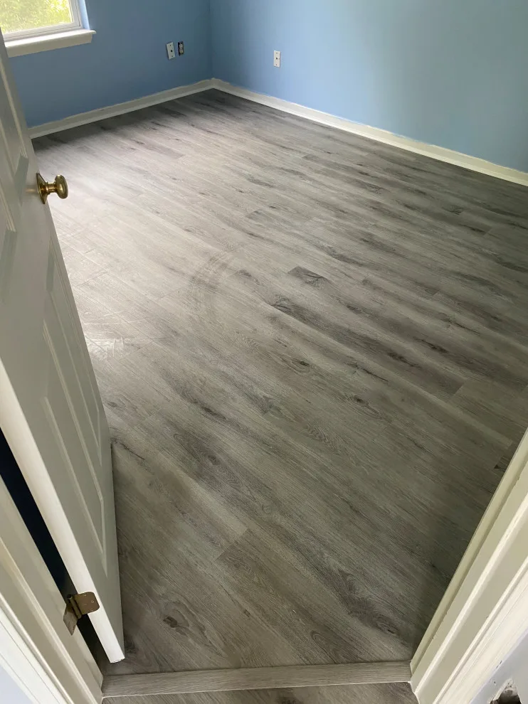 Stairs with vinyl plank and carpet by JCB Interiors LLC - Photo 2