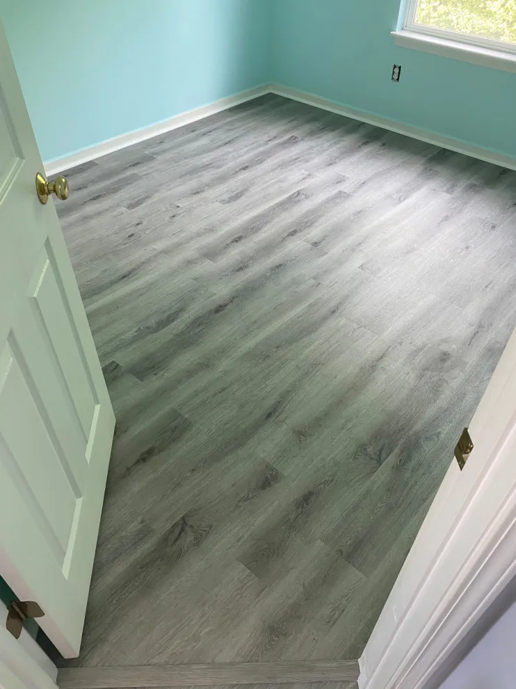 Stairs with vinyl plank and carpet by JCB Interiors LLC - Photo 3